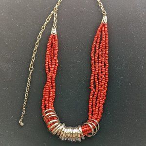 Orange Coral Six String Necklace with Gold Rings